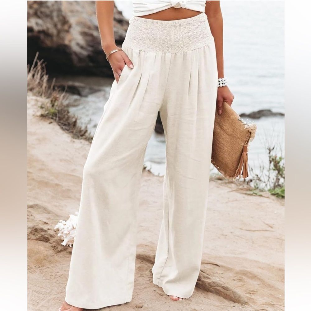 Elegant white linen, Palazio pants with pockets .